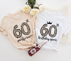 If you're looking for 60th birthday group shirts, these cute leopard 60th birthday crew tshirts are perfect! These ultra soft 60th birthday queen and coordinating 60th party crew tees make great 60th birthday party shirts or 60th birthday gifts for women! ✺ CHECK OUT more like this in our BIRTHDAY | ZODIAC section: https://www.etsy.com/shop/SagiCrabBoutique?ref=shop-header-name&listing_id=1419080194&section_id=38304379 ✺  WANT SOMETHING PERSONALIZED OR DON'T SEE THE COLORS YOU WANT?  If you're interested in customizing something or would like to make a small change to a design/colors, send us message and we'll be happy to work with you. ◡̈  ABOUT TANK TOPS  ✺ Racerback cut ✺ Slim fit ✺ 60% cotton, 40% polyester ✺ Extra-light fabric ✺ Tear-away label ✺ Run smaller DUE TO THEIR SLIM FIT, THE 60th Birthday Gifts For Women, Birthday Queen Shirt, Birthday Group Shirts, Queen Shirt, Birthday Queen, Queen Shirts, 60th Birthday Party, 60th Birthday Gifts, Birthday Party Shirt