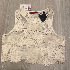 Purchased This In A Boutique In Miami. Brand Is "Signature 8." Measurements Posted; Is Also Nwt. Is In A Nice Ivory/Cream Color. Elegant Floral Print Summer Crop Top, Summer Floral Print Lace Top, Beige Lace Tops For Spring, Fitted Floral Print Lace Top For Summer, Cream Sleeveless Crop Top For Spring, Chic Cream Tops With Floral Embroidery, Spring Chic Lace Crop Top, Chic Spring Lace Crop Top, Chic Lace Crop Top For Spring