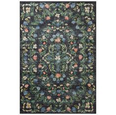 an intricately designed rug with flowers and leaves