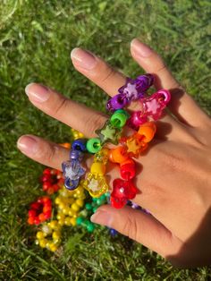 Kandi Rings 🌟 Chunky and cute kandi rings with star charm available as the perfect accessory to shine bright! Perfect for spreading PLUR anywhere and always handmade with love <3 If you would like specific colored rings in your order please write your choice of color in the customization box. For custom orders - please message me. Follow my journey on instagram @squishkandi ✨ Fun Star-shaped Jewelry For Gifts, Playful Multicolor Star-shaped Jewelry, Rainbow Star-shaped Jewelry With Star Charm, Colorful Star-shaped Jewelry For Gifts, Playful Multicolor Jewelry With Star Charm, Handmade Rainbow Star Jewelry, Kandi Necklace, Diy Kandi Bracelets, Diy Kandi