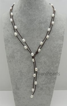 "Leather is 2 mm thick, baroque pearl,high luster pearl. please select necklace length. Note: show picture is 30 inches length Back to Other Jewelry Section 01: \"Tahitian,Akoya,Sea Pearl\" Section: https://www.etsy.com/shop/WenPearls?section_id=15806339 02: \"Potato/Near Round Pearl\" Section: https://www.etsy.com/shop/WenPearls?section_id=16378067 03: \"Round Pearl\" Section: https://www.etsy.com/shop/WenPearls?section_id=16163245 04: \"Rice/Oval/Teardrop Pearl\" Section: https://www.etsy.com/ Adjustable Pearl White Lariat Necklace, Adjustable Lariat Pearl White Necklace, Pearl Leather Necklace, Leather Pearl Jewelry, Leather Pearl Necklace, Necklace Leather, Cord Jewelry, Pearl Leather, Necklace Pearl