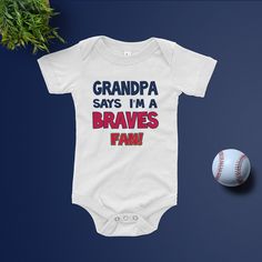 "🥰 STRENGTH GRANDPA AND BABY BONDS - Grandpa says I'm a BRAVES Fan bodysuit is the perfect way to show love to your family with this sporty baby shirt. Excellent for a pregnancy announcement to Grandpa or any relative. ⚾️ SEASON READY - Whit this adorable BRAVES baby shirt, the baby is ready to attend every game, and cheer with Grandpa the favorite team. 😍 HIGH QUALITY AND PROFESSIONAL PRINT - This grandpa says I am a BRAVES fan does not just look high-quality; it is high-quality! The baby tee White Cotton Sports Bodysuit, White Sports Onesie With Letter Print, Sporty Onesie With Letter Print For Sports, Casual Sports Onesie With Letter Print, White Sporty Onesie For Sports, Baby Cubs, Red Socks Fan, Ways To Show Love, Show Love