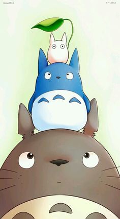 totoro and totoro sitting on top of each other