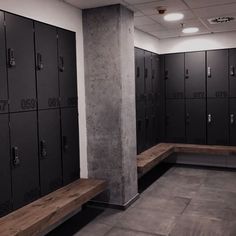 lockers are lined up against the wall in an empty room