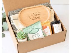 the welcome home gift box is filled with goodies