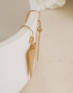 "18K Gold Plated Triangle dangle earrings, minimalist earring drop earrings, gold earrings, geometric earrings, unique gifts for women Lightweight and comfortable to wear these earrings are perfect sparkle for everyday! * They will make a great gift! * Total length of the earrings is 48 mm/ 1.9 \" approx from top to bottom. * Weight: 4 Grams * Material: 18k Gold Plated * The gold plating is a high quality 3 microns 18k gold thick * Pendants are Highet 31 mm, Width 15 mm * Ear wires are gold plat Minimalist Dangle Linear Earrings As Gift, Handmade Gold Long Drop Threader Earrings, Minimalist Yellow Gold Dangle Earrings, Handmade Minimalist Long Drop Linear Earrings, Gold Minimalist Drop Earrings, Minimalist 14k Gold Filled Teardrop Dangle Earrings, Handmade Minimalist Teardrop Earrings, Modern Gold Threader Earrings As Gift, Minimalist Dangle Linear Earrings With French Hook