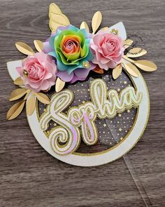 a close up of a sign with flowers on it and the word sew spelled out