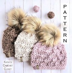 three crocheted hats with two pom - poms on the top and one is