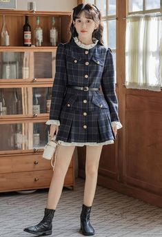 This preppy mini dress features a modest high neckline, button-down closure, faux pockets at the chest and hips, and frilly cuffs. Its shoulders are slightly puffed for an exquisite sense, and the skirt is pleated at the hem with a longer lining to produce an underskirt effect. A belt is included to cinch the waist. S: 32" chest, 25" waist, 30" lengthM: 33.5" chest, 26.5" waist, 30.5" lengthL: 35" chest, 28" waist, 31" lengthXL: 36.5" chest, 29.5" waist, 31.5" length Preppy Long Sleeve Dresses For Fall, Preppy Mini Dress For Fall, Preppy Fitted Dresses For Work, Fall Mini Dress With Pockets, Preppy Dresses For Fall Workwear, Preppy Dresses For Work In Fall, Preppy Mini Dress For Work, Preppy Fall Workwear Dresses, Long Sleeve Mini Dress With Ruffle Hem For Work