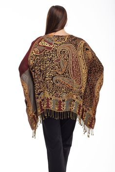 With a gorgeous paisley print, this poncho by La Cera is a beautiful piece that you can wear casually or dress up. This versatile accessory is made of a rayon knit construction with a scoop neckline. Style: PonchoMaterial: 100% RayonPattern: Paisley Care Instruction: Machine WashColor: Burgundy Dimensions: O/SModel Number: 5757 701 Elegant Paisley Print Pashmina Shawl For Fall, One Size Fall Pashmina Shawl, Fall Bohemian Pashmina Shawl In One Size, Fall Pashmina Shawl With Paisley Print, Fall Pashmina Shawl One Size, One Size Pashmina Shawl For Fall, Fall Paisley Print Pashmina Shawl, Fall Paisley Print Shawl, Bohemian Brown Pashmina Shawl For Fall