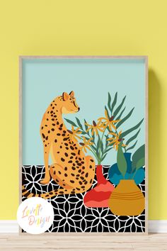 a poster with a cheetah sitting on top of it next to a potted plant