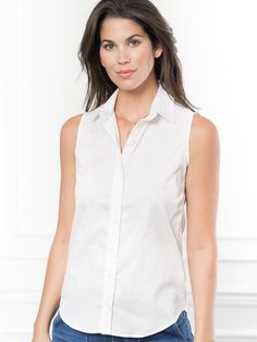 Our warm weather staple. Layered or on its own, The Sleeveless Shirt is a classic re-imagined to suit your downtown/uptown sensibilities. Narrow armholes mean bra won't peek through side (and won't peek through front either.)

The Shirt reimagined for the perfect fit – powered by No Gape® button technology. Bye bye blouse gape, Hello The Shirt. Patented and designed by Rochelle Behrens to eliminate blouse gape. 



 
 * In our cotton stretch, sourced from Spain. 
 * 72% Cotton, 23% Polyamid Elegant Everyday Cotton Tank Top, Classic Vest Top For Layering, Classic Sleeveless Tops For Everyday, Classic Cotton Vest Top, Classic Tank Top For Layering, Classic White Tank Top For Daywear, Cotton Tank Top For Workwear, Classic Cotton Tank Top For Daywear, Classic Cotton Tank Top For Work