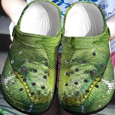 Get your product: Snake Crocs Classic Clogs Shoes
1. PRODUCT INFORMATION:

Incredibly light and fun to wear.
Water-friendly and buoyant; weighs only ounces.
Ventilation ports add breathability and help shed water and debris.
Easy to clean and quick to dry.
Upper: Croslite.
Lining: Croslite.
Sole: Croslite.
2. SIZE CHART:
3. RETURN:
We will gladly issue you a replacement item or issue a refund back to your original form of payment for any of the following reasons:
You receive an incorrect item
Yo Outdoor Non-slip Slip-on Clogs, Non-slip Synthetic Slide Clogs, Green Synthetic Slip-on Clogs, Green Slip-on Synthetic Clogs, Synthetic Round Toe Clogs For Sports, White Synthetic Clogs For Outdoor Activities, Casual Durable Green Clogs, Durable Green Casual Clogs, Breathable Slip-on Clogs For Outdoor Activities