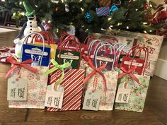 christmas presents are wrapped in paper and tied with ribbons