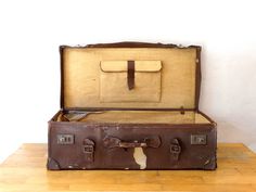 Antique Suitcase, Travel Luggage, Leather Train Case, Leather Valise, Suitcase Table An Antique (1920-30) travel suitcase,covered with genuine leather.. The suitcase is in Fair Antique condition (used) with a lot of spots upon metal and leather parts. The interion part is in Fair Antique Condition too. Only for Decorative purposes...its an antique suitcase... Please check all photos.. Leather Suitcase Dimensions: Base : 88 x 45 cm or 34.64 x 17.71 inches Height: 26.5 cm or 10.43 inches Weights a Brown Rectangular Travel Bag, Brown Rectangular Travel Case, Brown Rectangular Cases For Trip, Rectangular Brown Cases For Trip, Brown Rectangular Cases For Trips, Brown Cases With Luggage Sleeve For Trip, Vintage Brown Luggage For Trips, Antique Suitcase, Suitcase Table