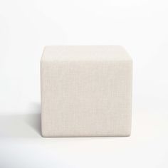 a white cube sitting on top of a table