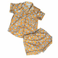 "A brand new print just for #tiger fans Celebrating the majestic tiger, every single print has been block printed by HAND by our amazing artisans and each pajama is individually sewn. These short sleeve / shorts are amazingly comfy and adorable all at the same time.  Details such as the piping and pockets make these pajamas perfect to lounge in, sleep in, or just about do anything in!   100% lightweight cotton with hand block printed design Relaxed fit, shorts come with elastic waist and pockets Cotton Sets With Graphic Print And Relaxed Fit, Printed Short Sleeve Tops For Bedtime, Printed Short Sleeve Sleepwear For Home, Summer Cotton Tops With Tiger Print, Orange Cotton Short Sleeve Sleepwear, Orange Short Sleeve Sleepwear For Loungewear, Yellow Cotton Short Sleeve Sleepwear, Orange Printed Cotton Set, Relaxed Fit Graphic Print Sets With Short Sleeve