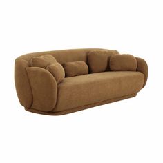 a brown couch sitting on top of a white floor