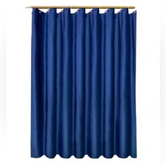 a blue shower curtain hanging on the side of a white wall with a wooden rod