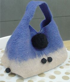 a handbag made to look like a cat