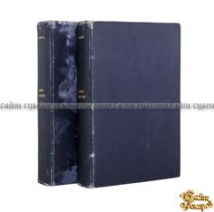 two blue books sitting side by side on top of each other in front of a white background