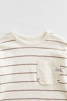 Round Neck Long Sleeve Shirt. Patch Pocket At Chest With Label Appliqué. Cute Cream Tops With Letter Print, Zara Beige Cotton Tops, Basic Zara Cotton Top, Zara Basic Cotton Top, Cute Long Sleeve Zara T-shirt, Beige Long Sleeve Cotton T-shirt, Cute Striped Cotton T-shirt, Cute Cream Cotton Tops, Cute Striped Cotton Tops