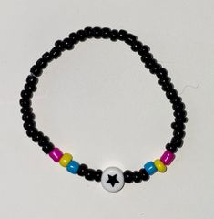 The beaded Pansexual Pride Bracelet was handmade with love. This bracelet is one size fits all and has stretch. Pulseras Kandi, Diy Kandi Bracelets, Pride Jewellery, Pride Bracelet, Pansexual Pride, Kandi Bracelets, Diy Bracelet Designs, Handmade Jewelry Tutorials, Funky Jewelry