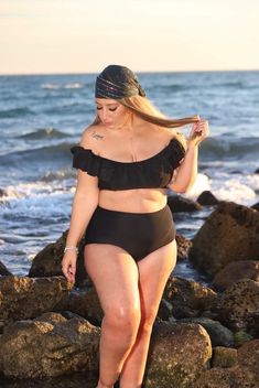 Black Off-shoulder Swimwear For Beach Season, Off-shoulder Black Swimwear For Beach Season, Off-shoulder Black Swimwear For Beach, Black Stretch Tankini With Ruffles, Black Ruffled Swimwear For Pool, Black Stretch Ruffle Tankini, Black Off-shoulder Swimwear For Beach, Black Ruffled Swimwear For The Pool, Black Ruffled Swimwear For Beach Season