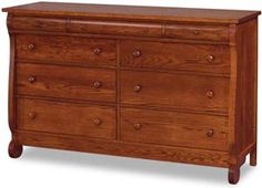 a large wooden dresser with many drawers