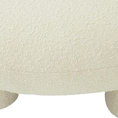 the back end of a white ottoman