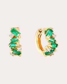 Unapologetically bold, these huggie earrings are decorated with asymmetric clusters of round white diamonds and baguette-cut emeralds. The 18-karat yellow gold bases create a dimensional effect. Hinge click closure 18k yellow gold, emerald and white diamond Carat: 0.1 ctw diamond, 0.7 ctw emerald Diamond color: G Diamond clarity: VS Polish with soft cloth Made in the USA Measurements Width: 5.5mm Suzanne Kalan, Diamond Hoop Earrings, Huggie Earrings, Baguette Cut, Emerald Diamond, White Diamonds, Huggies Earrings, Diamond Clarity, White Diamond