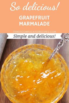 an orange marmalade in a glass bowl with text overlay that reads so delicious grapefruit marmalade simple and delicious