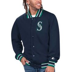 a man with dreadlocks wearing a baseball jacket