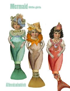 three mermaid dolls are standing next to each other on a white background with the caption mermaid into arts