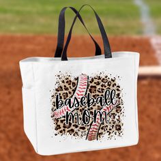 The perfect tote to carry all your necessities for a day at the ballpark! Bags are 12X12X6.5. Looking for one to match your team colors? Message us today! Sporty White Bag For Shopping, Large Capacity Rectangular Bags For Sports Events, Sporty White Shopping Bag, White Tote Bags For Sports Events, White Sporty Shopping Bag, White Tote Bag For Sports Events, Ball Field Mom Bag, White Sports Tote Bag, White Letter Print Sports Bag