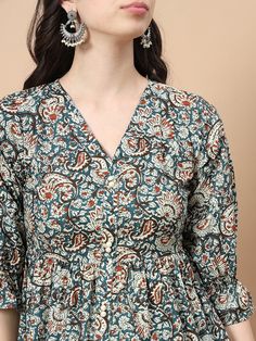 Blue Pure Cotton Floral kalamkari peplum Top ,Has A V-Neck,Three quarter sleeve(Puff Sleeves)Striped Hem, Size & Fit Material & Care Pure Cotton Hand Wash Length :Hip length Shape :Peplum Work :Floral,kalamkari Neck Line :V-neck Fabric :Pure Cotton Color :BlueWash Care :machine wash Weight :150G Pack Contains :1 Top Printed Peplum Top, Boutique Dress Designs, Womens Business Casual, Boutique Dress, Indian Designer, Indian Designer Wear, Womens Size Chart, Designer Wear, Dress Designs