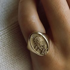 The November Birth Flower Signet Ring features a chrysanthemum, a bloom that symbolizes cheerfulness, love and loyalty. Shaped like a vintage saint charm with an intricate relief carving and a dainty diamond, this statement ring is handmade with love in Los Angeles. Show love to your favorite November baby (or yourself!) with this perfect addition to your everyday collection. November Flower, November Birth Flower, March Birth Flowers, February Birth Flowers, May Birth Flowers, Love And Loyalty, November Baby, Diamond Anklet, April Birth Flower