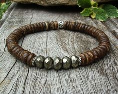 Men's Stretch Bracelet Coconut Bead Bracelet by BonArtsStudio Rustic Beaded Bracelets For Beach, Casual Brown Beaded Bracelets For Vacation, Mens Stretch Bracelets, Mens Designer Jewelry, Wooden Bracelet, Shell Bracelet, Southwest Style, Mens Beaded Bracelets, Coconut Shell