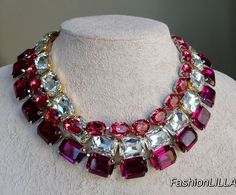 anna wintour necklace, Austrian crystal collet, fuchsia large octagon Georgian Paste riviere, rose pink oval necklace, statement necklace This group of individual necklaces are truly a la Anna Wintour style. clear ,fuchsia large octagon and rose pink oval crystals make them a true statement combination.  You can wear them individually all together, mix and match to accentuate your wardrobe. They can be ordered at a variety of lengths to create a unique combination every time you wear them.    Yo Anna Wintour Style, Large Pearl Necklace, Oval Necklace, Anna Wintour, White Necklace, Necklace Statement, Austrian Crystal, Rose Pink, Swarovski Crystal