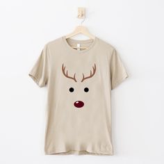 Reindeer Tee / Christmas Shirt / Christmas Tee / Reindeer Neutral Christmas Tee / Tan Christmas Shirt / Reindeer Sweatshirt Short Sleeve Tee Long Sleeve Tee Sand Sweatshirt Please message us with any questions you may have before ordering. Christmas Reindeer Shirt, Reindeer Shirt Target, Reindeer Sweatshirt, Reindeer Christmas Tshirt Unisex, White Christmas T-shirt With Character Print, Beige Sweatshirt, Neutral Christmas, Sweatshirt Short Sleeve, Christmas Tees