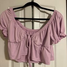 Pink Short Sleeve Shirt. Never Worn. Size Medium. Purple Short Sleeve Top For Brunch, Purple Summer Tops For Brunch, Trendy Purple Tops For Brunch, Casual Brunch Crop Top Blouse, Casual Crop Top Blouse For Brunch, Casual Cropped Tops For Brunch, Fitted Purple Top For Brunch, Purple Cropped Top For Spring, Purple Stretch Casual Blouse