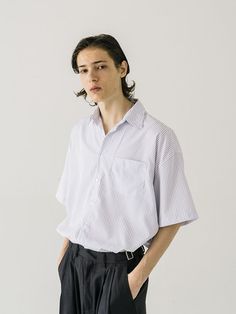 Editor's NotesThis refined shirt is tailored from the classic pin-striped pattern with a cool touch and designed in an oversized fit with a high-low hem. It goes well with various bottoms so it will be your versatile daily item.- Collared neck- Button fastenings- One chest pocket- Short sleeves- Hi-low hem- Oversized fitMeasurements (in.) M / L - Total Length (Front): 29.1 in. / 30.3 in. - Total Length (Back): 31.1 in. / 32.3 in.- Shoulder: 23.6 in. / 25.2 in. - Chest: 26.4 in. / 28.0 in. - Sleeve Length: 9.4 in. / 9.8 in.Model info: 5' 11.3, 130.1 lbs / Fitting size MComposition & Care- 100% Polyester- Dry clean- Water wash (do not dry clean)Designer- by VASTIC Pinstripe Shirt With Relaxed Fit And Short Sleeves, Pinstripe Short Sleeve Relaxed Fit Shirt, Modern Striped Shirt For Spring, Spring Business Shirt With Vertical Stripes, Classic Pinstripe Tops With Relaxed Fit, Casual Pinstripe Tops For Business Casual, Classic Pinstripe Short Sleeve Top, Pinstripe Shirt For Business Casual, Casual Pinstripe Shirt For Business Casual