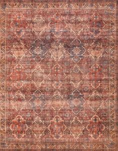 an old, faded rug with many different colors and patterns on the carpet is shown