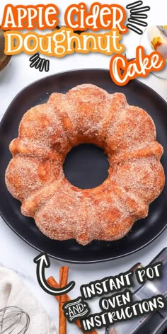 an apple cider doughnut cake on a black plate