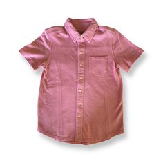 Light pink polo shirt that fully buttons down. Patch chest pocket. Like new condition 100% cotton Machine wash & dry Classic Pink Collared Polo Shirt, Classic Pink Polo Shirt, Solid Color Collared T-shirt With Pockets, Pink Cotton T-shirt With Pockets, Solid Collared T-shirt With Pockets, Pink Cotton Short Sleeve Shirt, Solid Spring Polo Shirt With Button Closure, Solid Polo Shirt With Button Closure For Spring, Classic Pink T-shirt For Summer