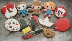 some cookies that have been decorated to look like horror movies