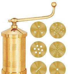 a gold colored coffee grinder with six different holes in the center and four smaller circles around it