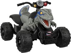 an image of a toy dinosaur riding on the back of a four - wheeled vehicle