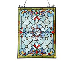 a stained glass window hanging on a chain