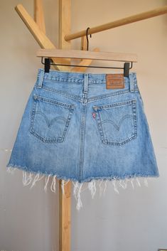 Levi's Premium denim skirt with frayed bottom hem

Tagged size 26 (see measurements)

Button down with four pockets

Cyanotype fern print on one front half of skirt Patchwork Denim Skirt, Street Punk, Patchwork Skirt, Denim Pencil Skirt, Leftover Fabric, Upcycled Fashion, Blue Fits, Plaid Mini Skirt, Denim Patchwork